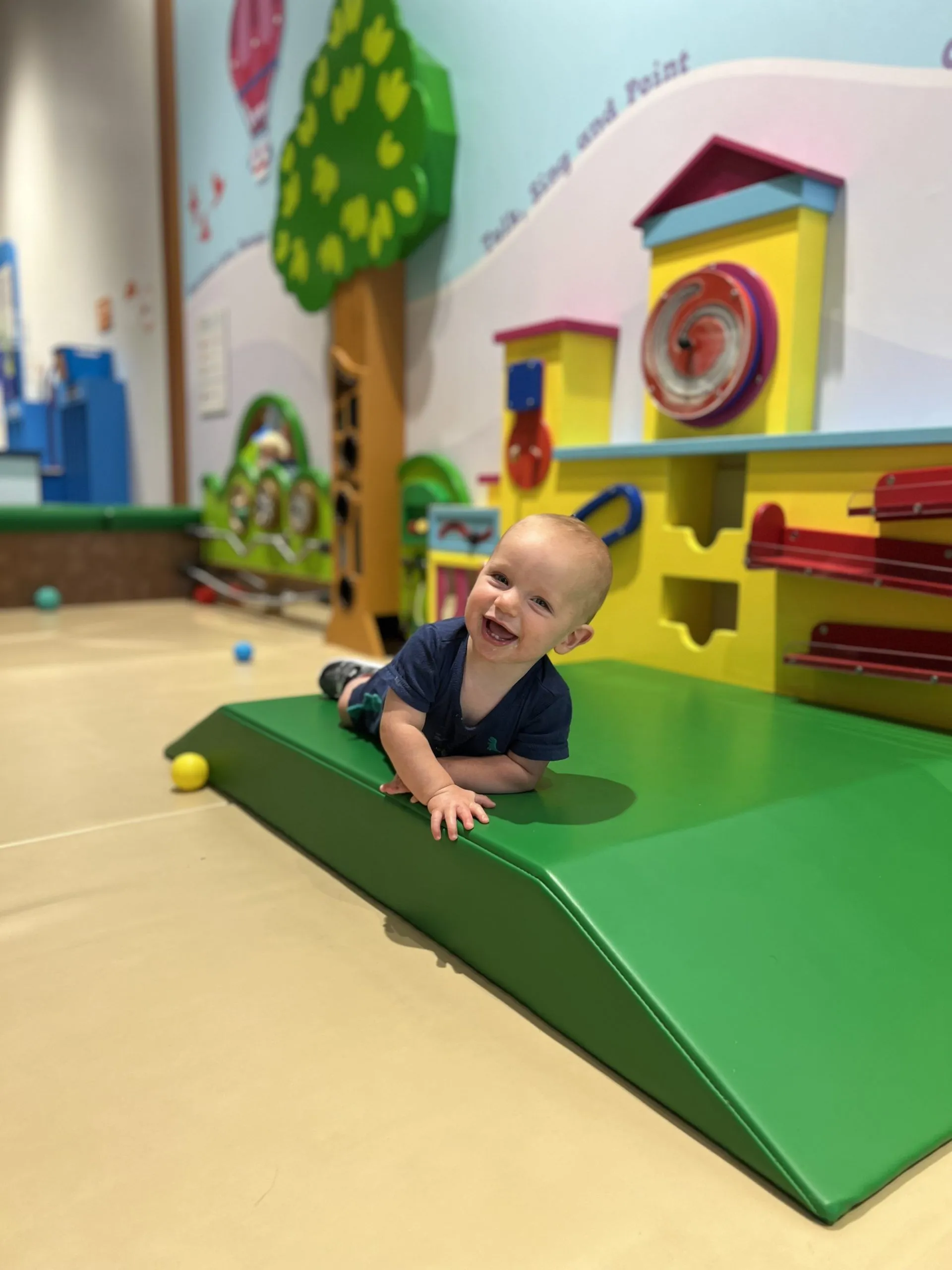 Toddler boy playing at the Children's Museum of the Upstate Spartanburg location.