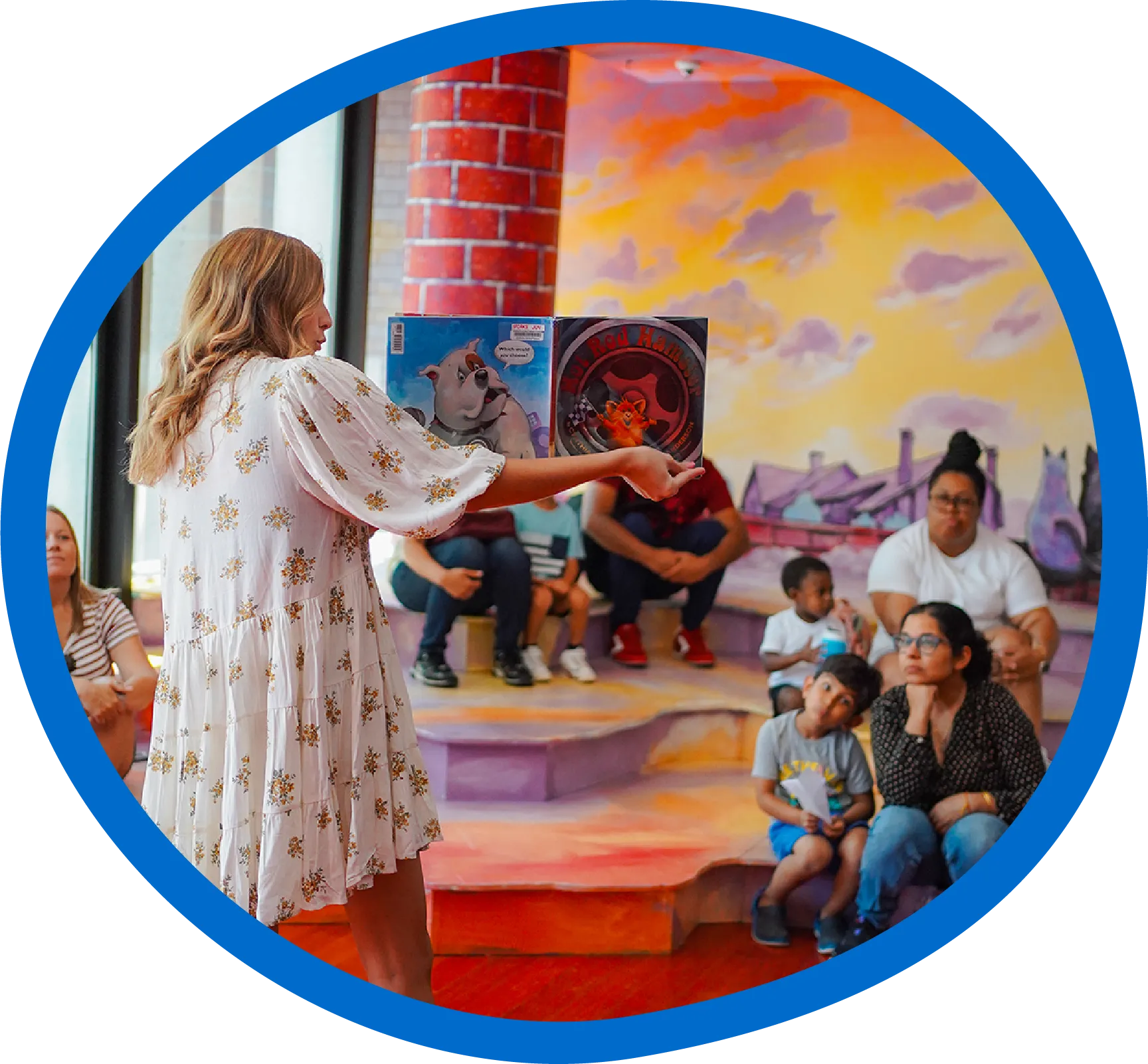 Storytime with the reader and kids in the dream theater at the Children's Museum of the Upstate Greenville location.
