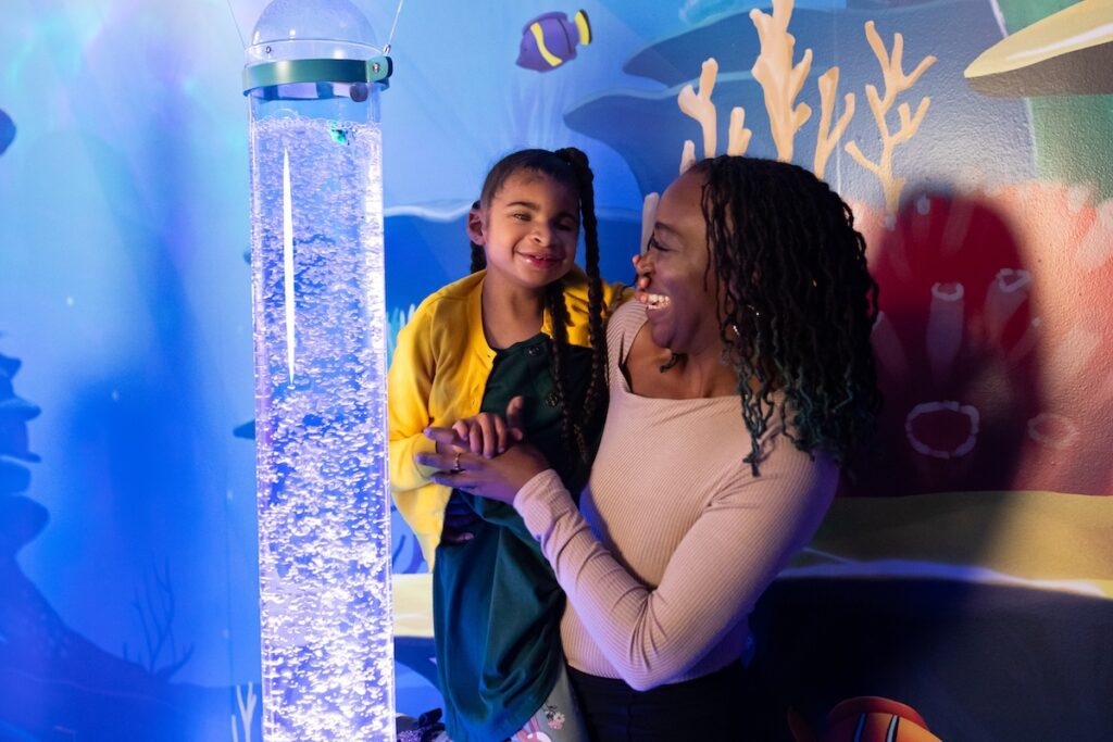 Mom and daughter at the Seasation museum exhibit