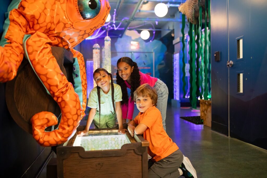 family visiting Seasations at the TCMU museum