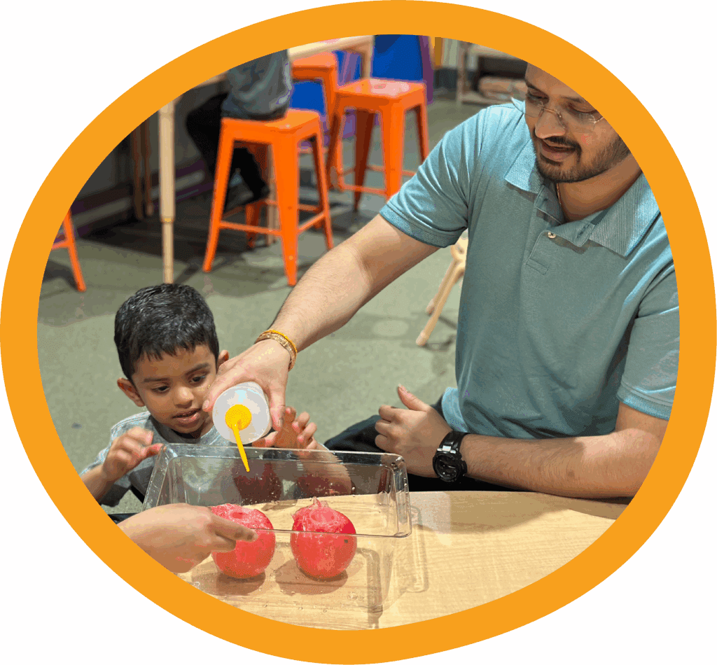 Father and son participating in a steamWORKS activity at The Children's Museum of the Upstate Greenville location.
