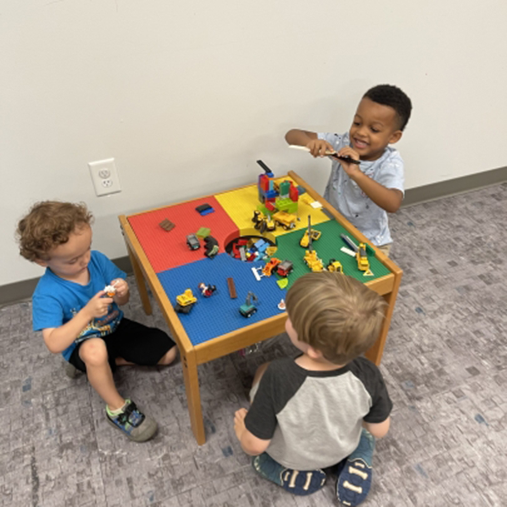 Kids playing with Legos at TCMU tots at the Children's Museum of the Upstate.